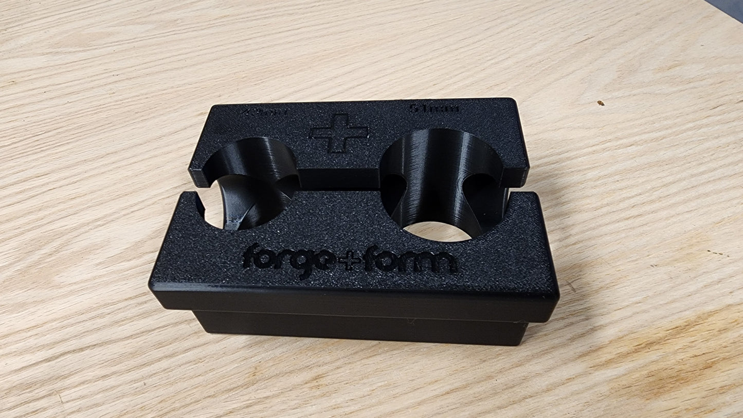 Magnetic soft jaw fork clamp keeping jaws in place on bench vice