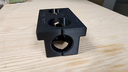 3D printed fork servicing clamp installed in workshop bench vice